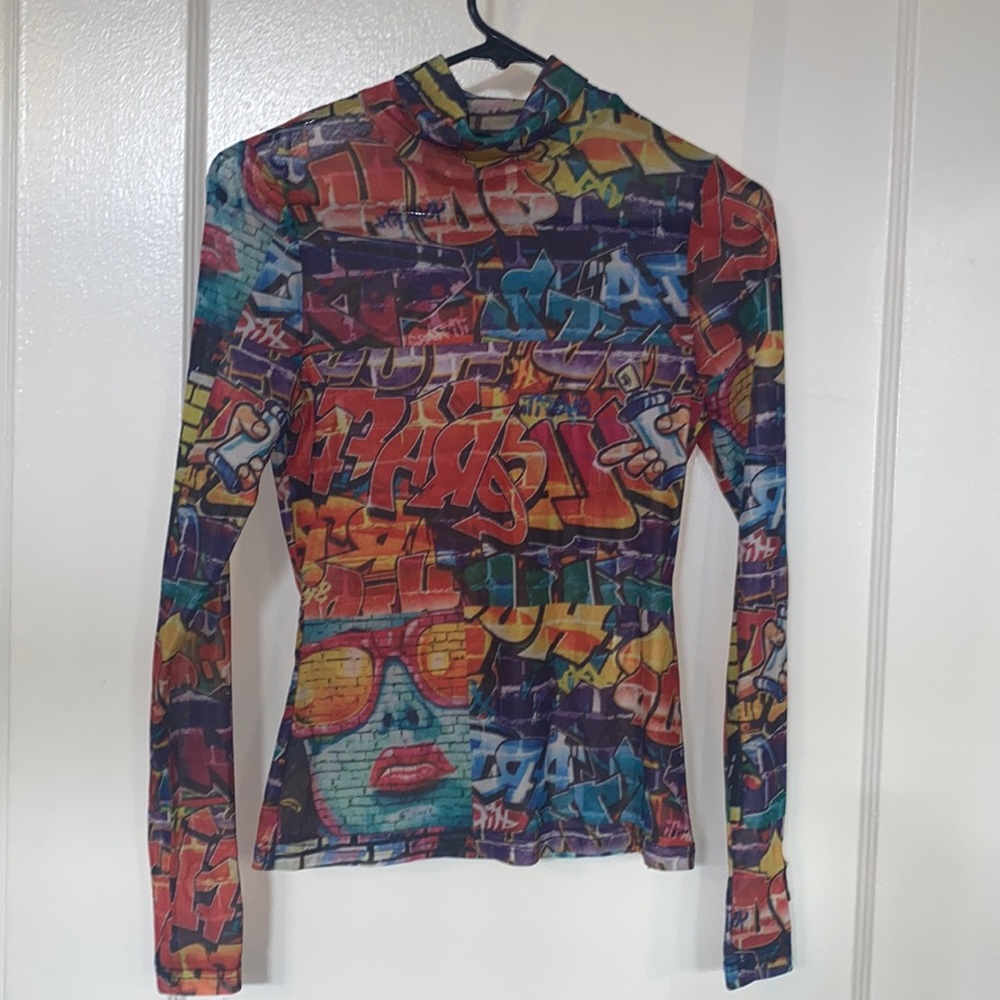 Sheer, mock neck, long sleeve printed top